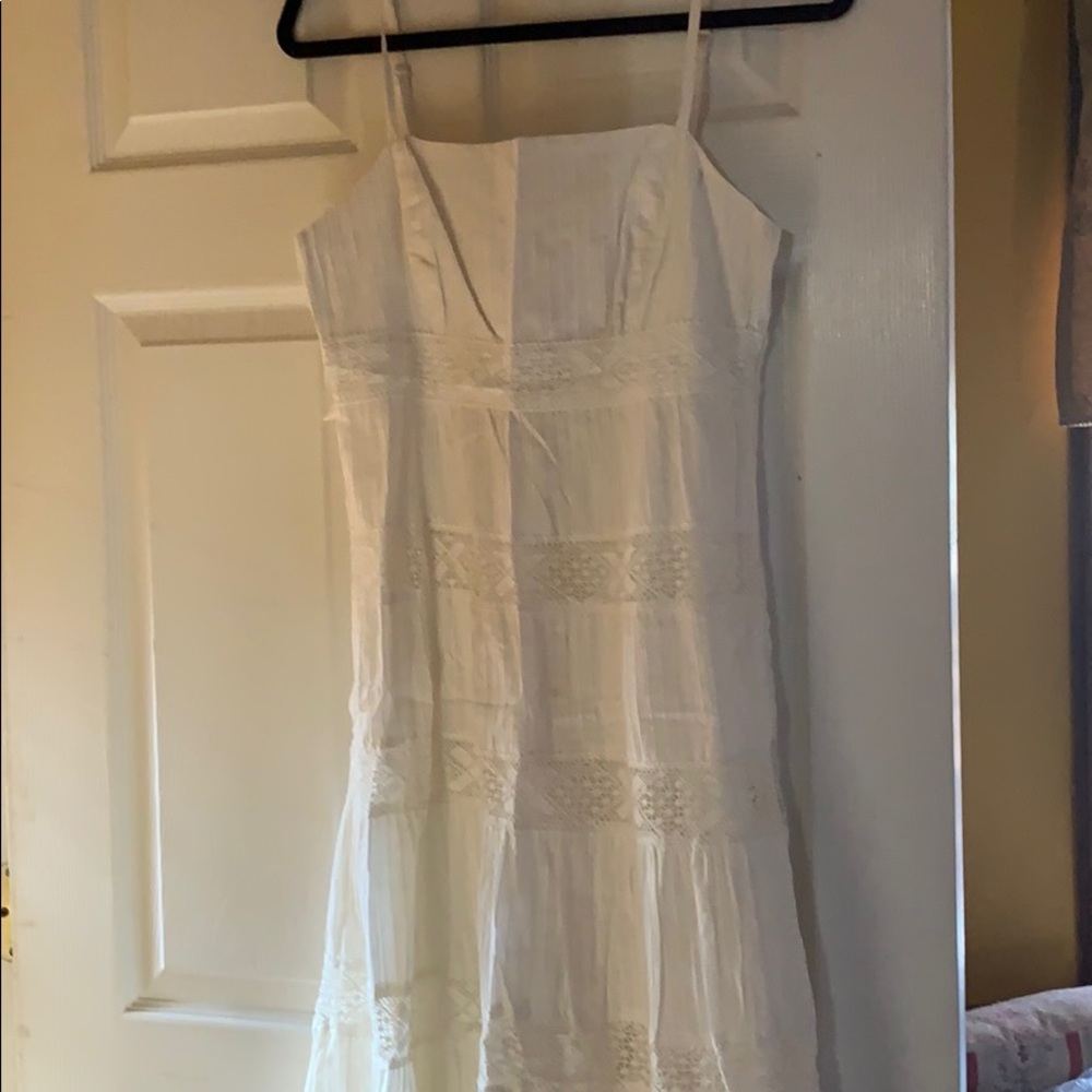 Never worn. Nice embroidery details.